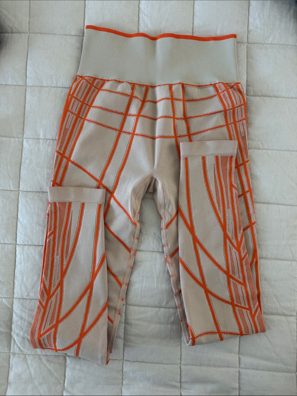 Gymshark Beige Leggings with Orange Geometric Trim